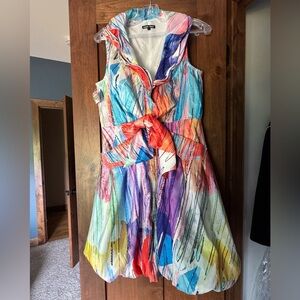 This adorable dress is so much fun. It’s a size S. Never worn.